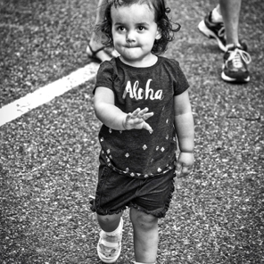 May 2018 • This little girl was bookin' it down Washington Street – with accompanying adult trying to keep up.